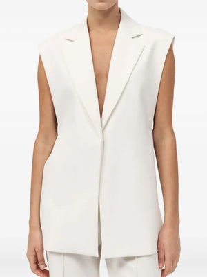 St. Agni Relaxed Side Tie Vest in Off White, showcasing the soft wool blend fabric, ideal for a comfortable and chic look.