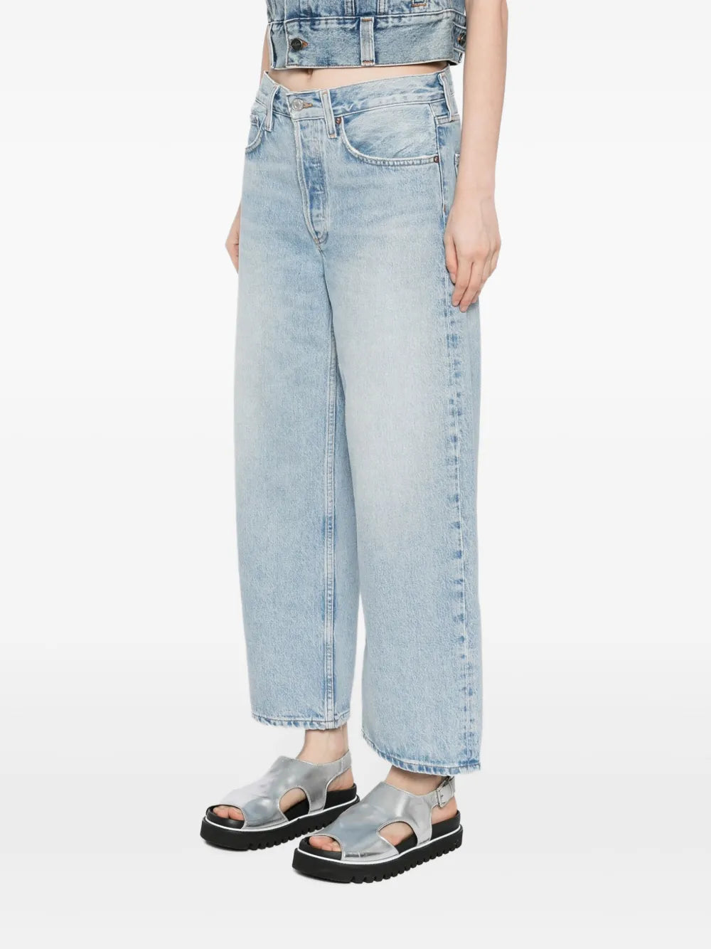 Agolde Arc Jean in Orten styled with boots, perfect for elevated layering and all-day wear.