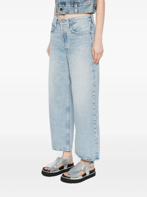 Agolde Arc Jean in Orten styled with boots, perfect for elevated layering and all-day wear.