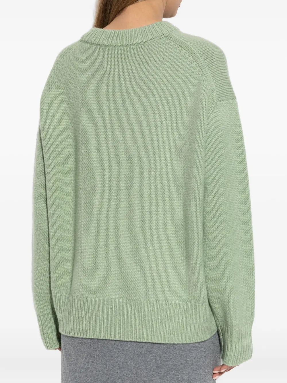 Side view of the Renske Sweater in Seafoam illustrating the dropped shoulders and relaxed fit.