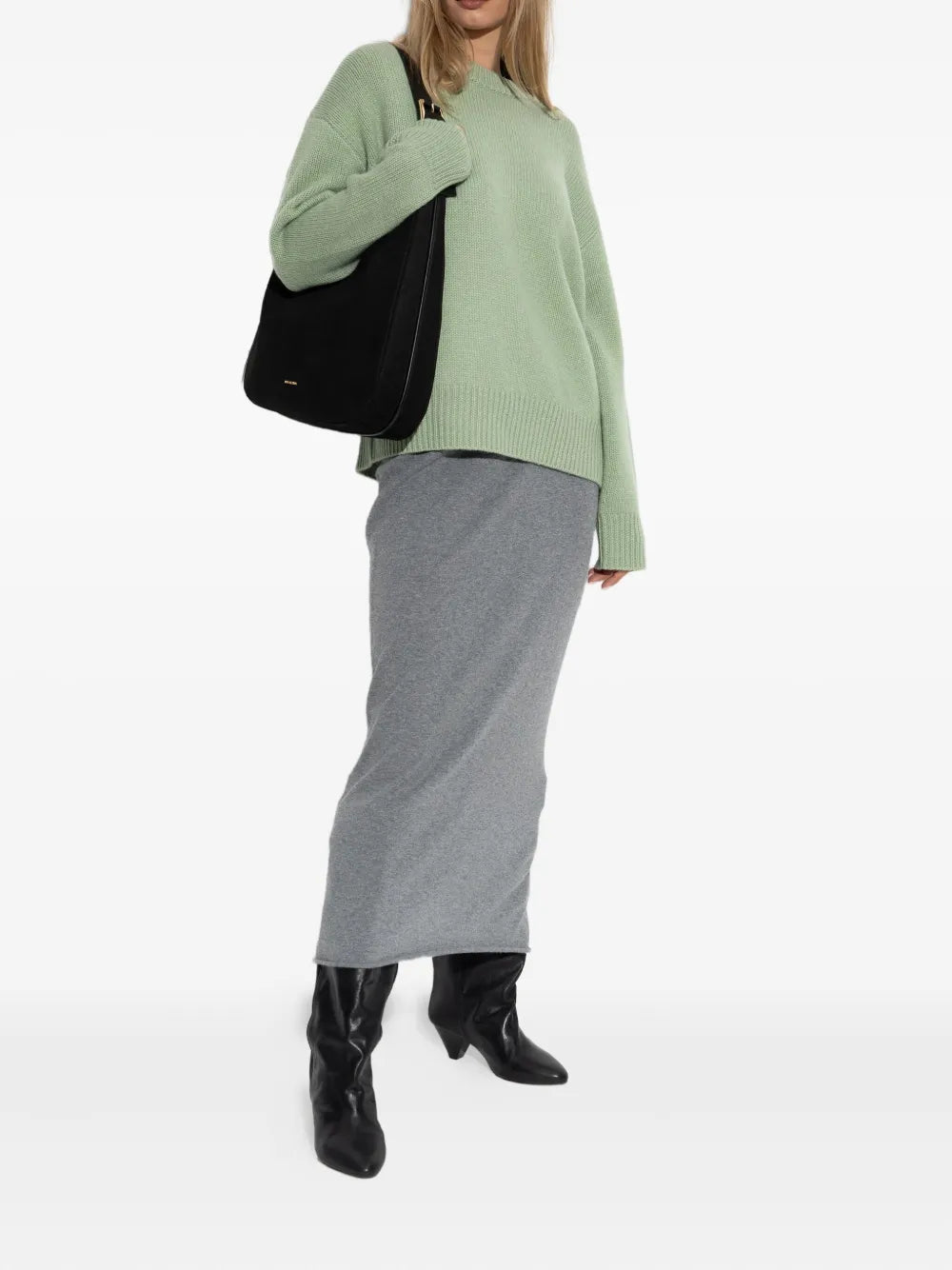 Up close view of the Renske Sweater in Seafoam showcasing its rich cashmere texture and chunky design.