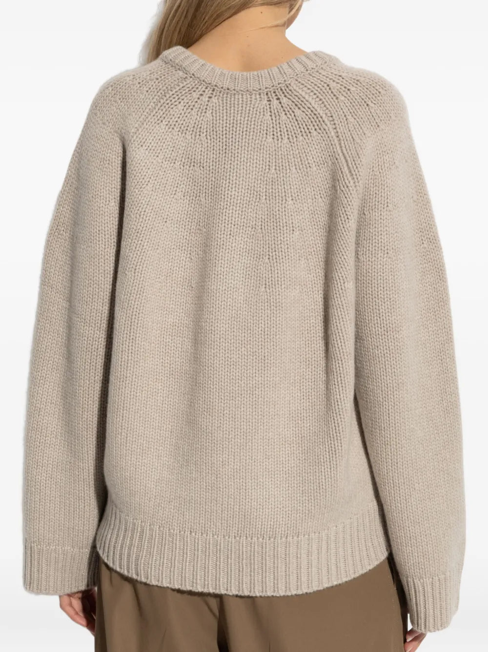 Oia Sweater in Sand, highlighting ribbed trims and the luxurious feel of 100% cashmere.