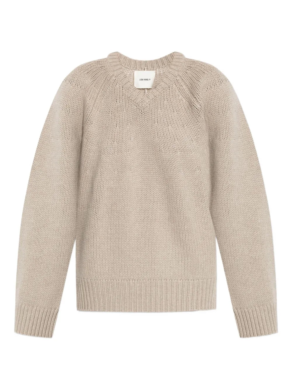 Oia Sweater in Sand, featuring a relaxed fit and a neat v-neckline, perfect for cooler weather.