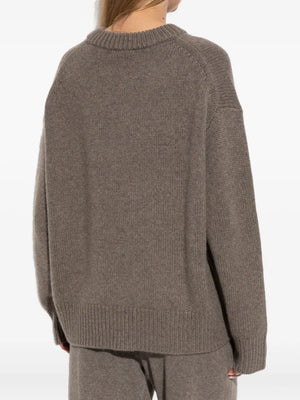 Close-up of the Renske Sweater in Truffle, demonstrating the cozy 100% cashmere fabric and intricate knit.