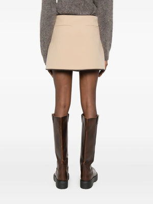Back view of the Sheridan Mini Skirt in Light Camel highlighting its design and fit.
