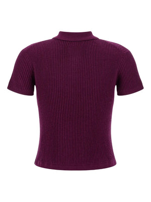 Flat lay of the Shrunken Polo in Aubergine, emphasizing its fine cashmere composition and vibrant color.