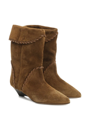 Close-up of Edoa Boots in Light Bronze showing smooth braided leather finishes.