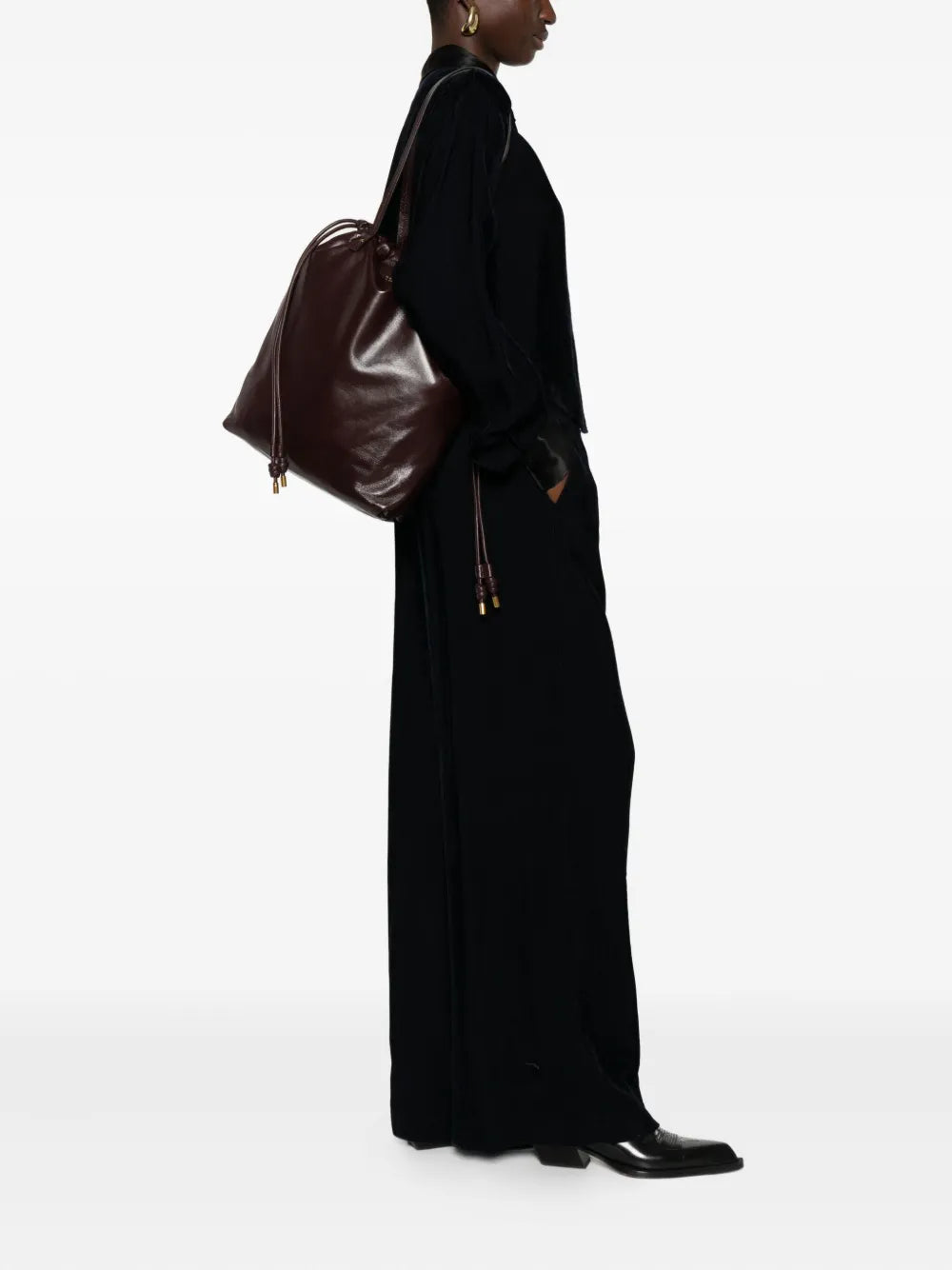 Close-up view of Silven N/S Shopping Bag in Burgundy showing the embossed Isabel Marant logo.