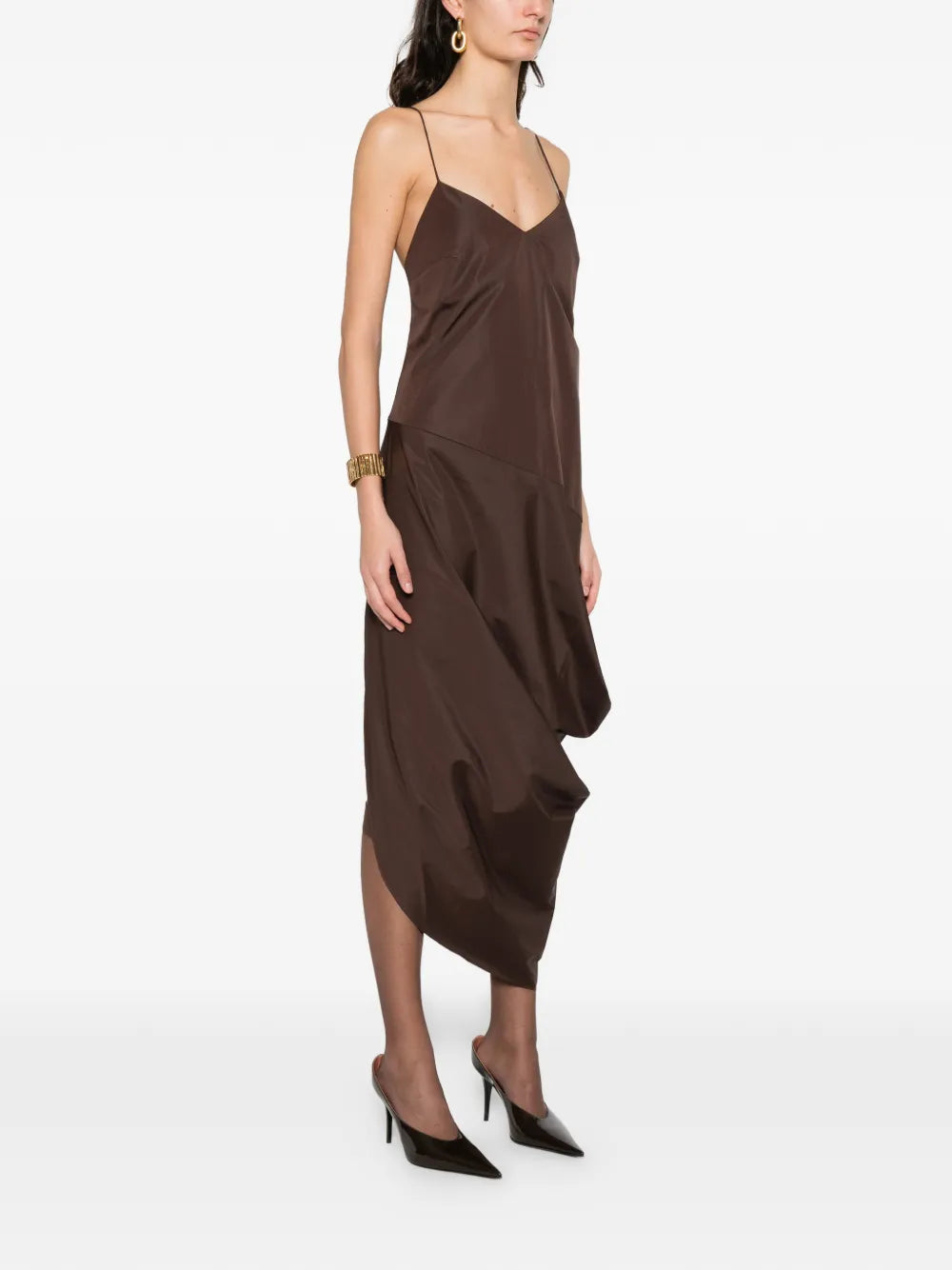 Side view of the Paper Taffeta Drape Dress in Mocha, showcasing the sculptural hip panel and draped hem.