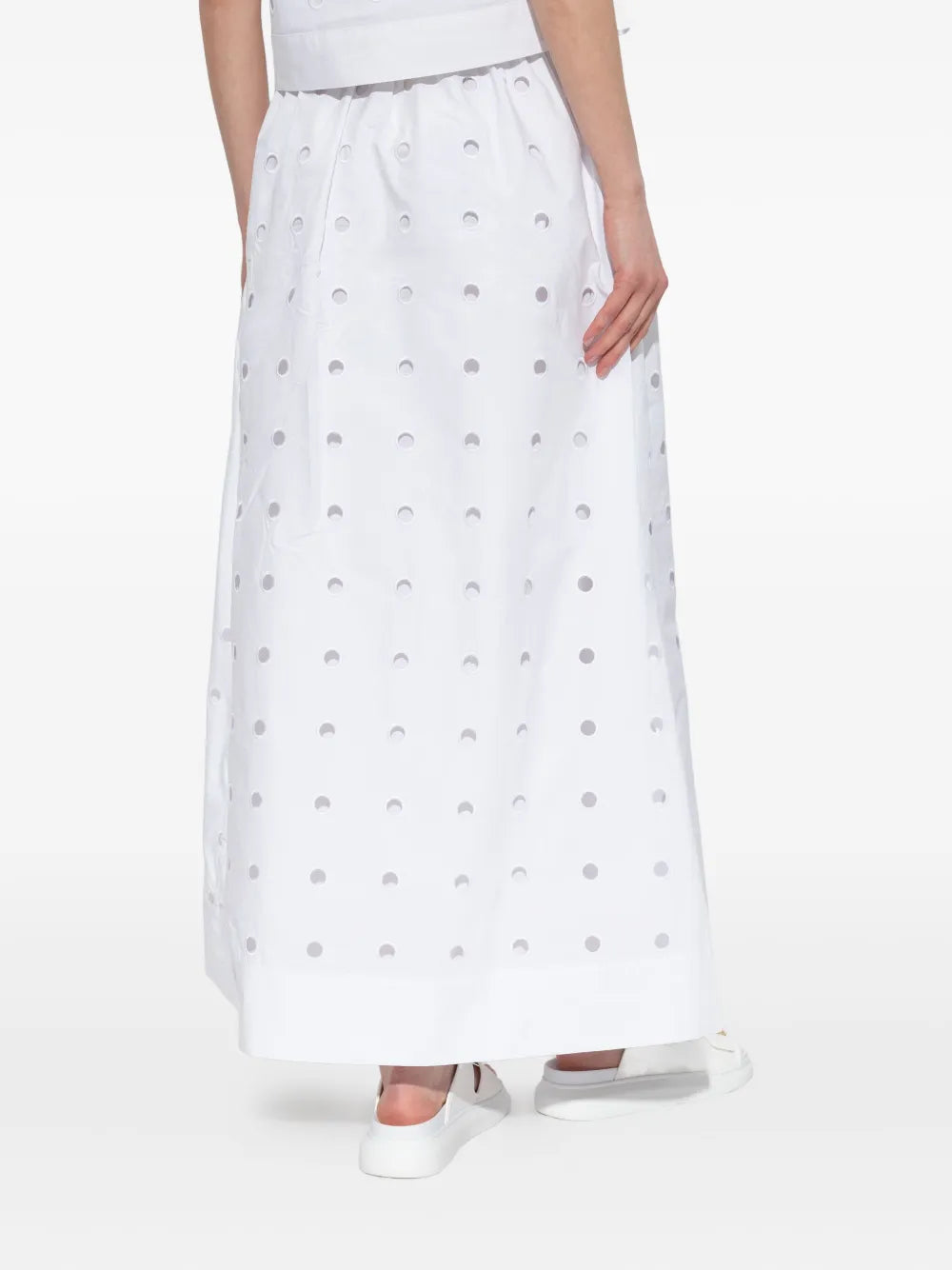 Back view of the Peggy Skirt in Vintage White with detachable slip, highlighting the elegant cotton laser cut skirt detailing.