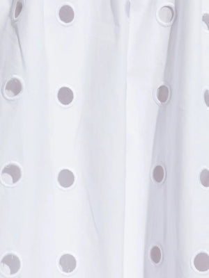 Flat lay of the Peggy Skirt in Vintage White showing the exquisite laser cut embroidery on this cotton laser cut skirt.