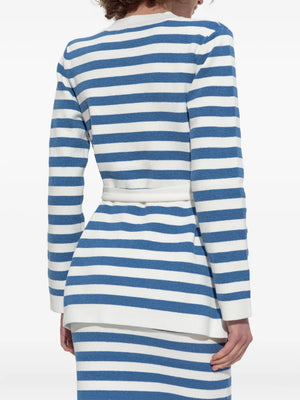 Model wearing the Ari Cardigan in Blue Stripe, an elegant striped cardigan for women ideal for layering.
