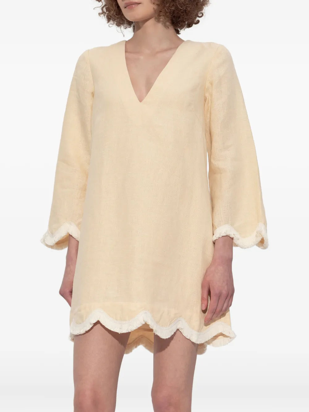 Model wearing the Essie Kaftan in Dusty Citron, a must-have mini kaftan dress, perfect for summer outings.
