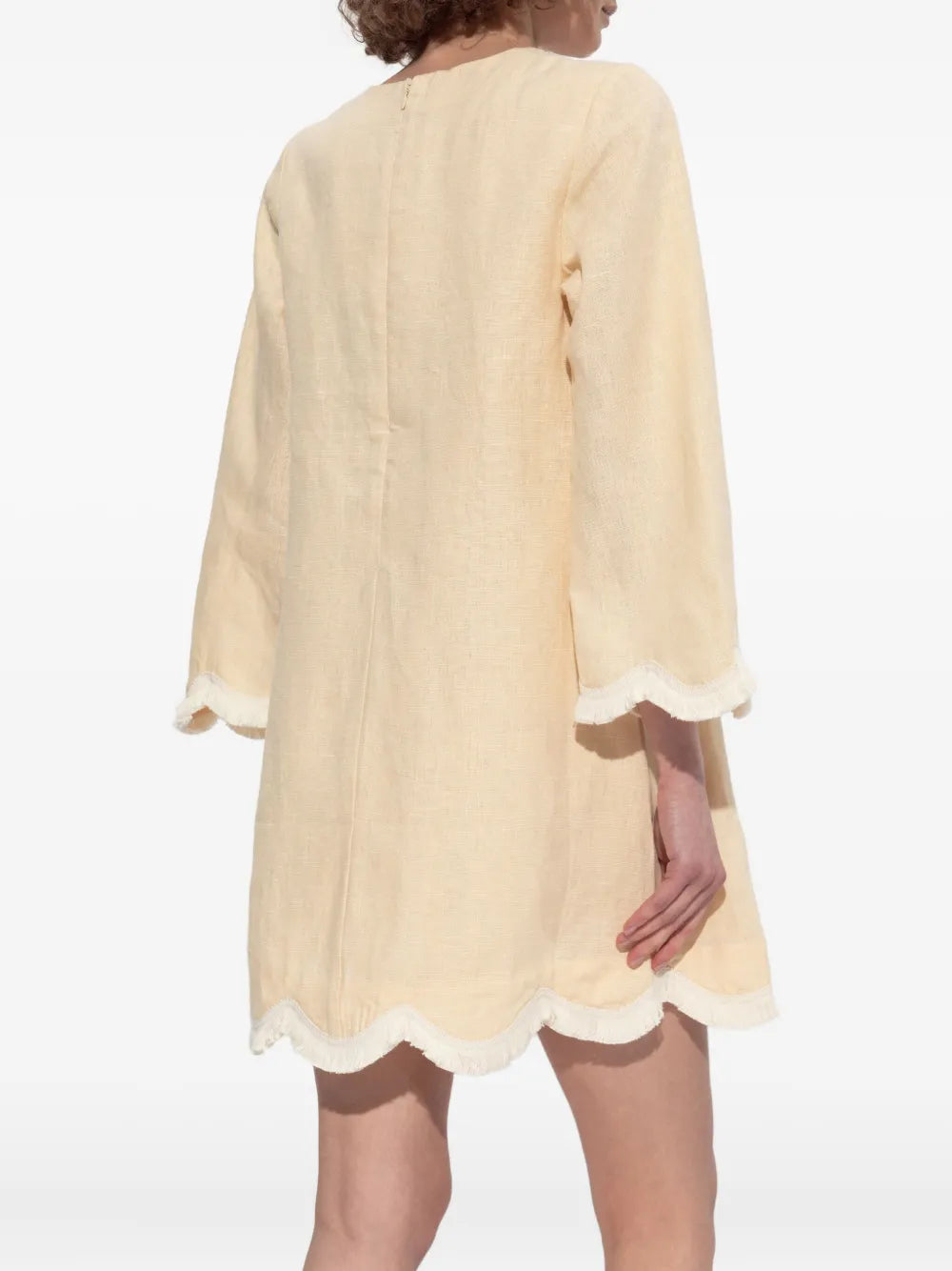 Back view of the Essie Kaftan in Dusty Citron, highlighting the flowing design of this elegant mini kaftan dress.
