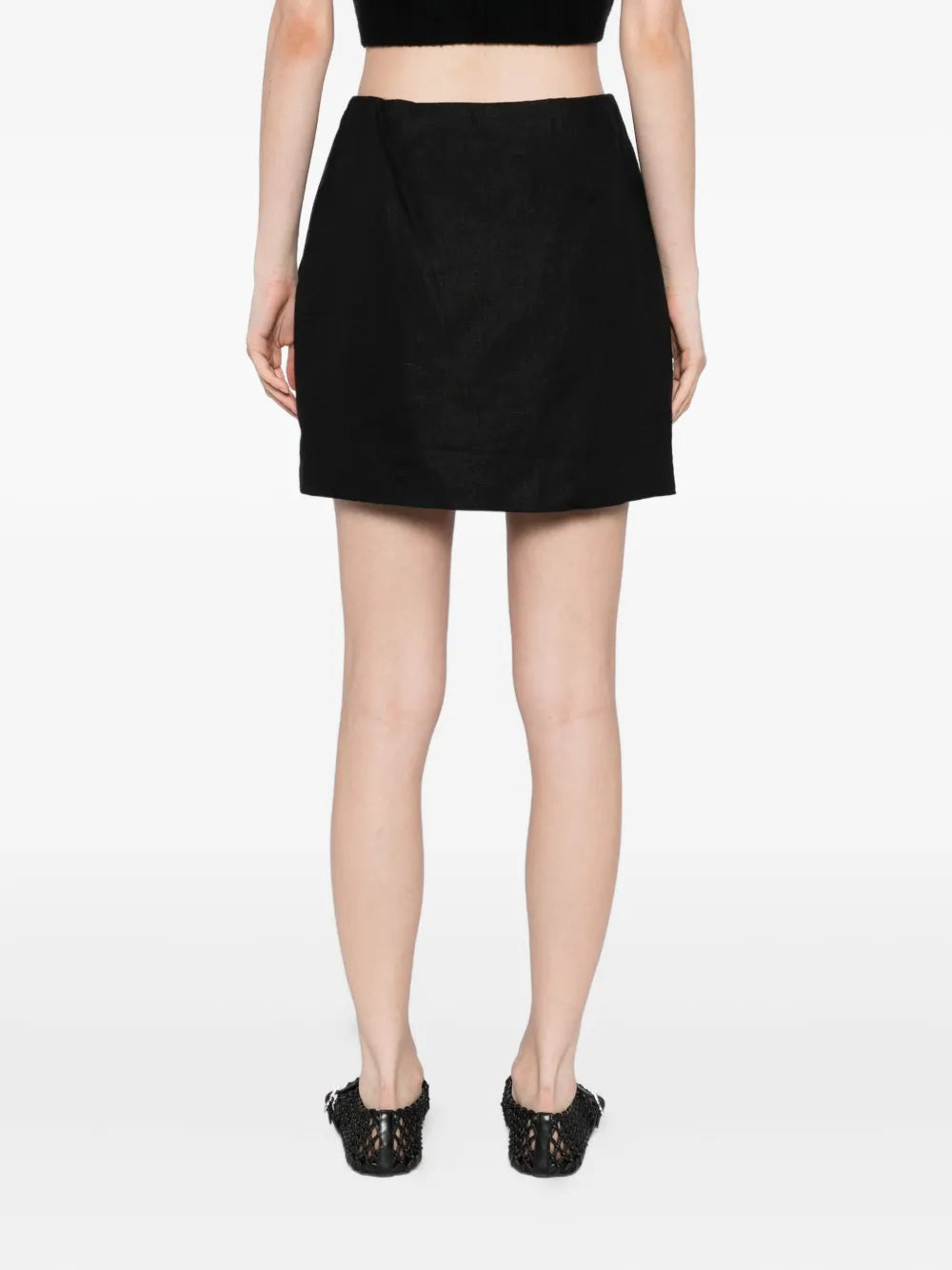 Alice Skirt in Black - back view featuring the stylish cut and comfortable fit.