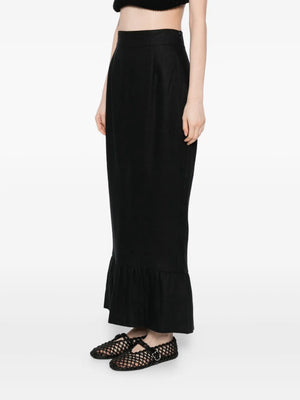 Matilda Column Skirt in Black modelled on a person, demonstrating the stylish and comfortable fit of this elegant skirt.