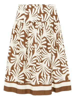 The Diya Skirt in Catalina Khaki featured in a flat lay, showcasing the beautiful fabric and design details.