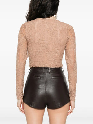 Back view of the Lace Bodysuit in Biscuit, highlighting the mesh lining and design details.