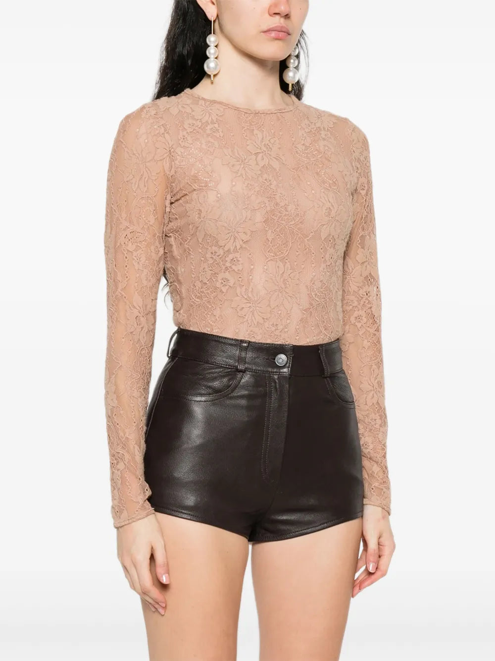 Model wearing the Lace Bodysuit in Biscuit, showcasing the elegant fit and style.