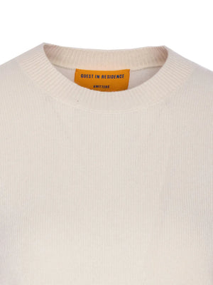 Close-up of the Shrunken Crew in Cream by Guest in Residence, showcasing its lightweight knit texture and high rib sleeve cuffs.
