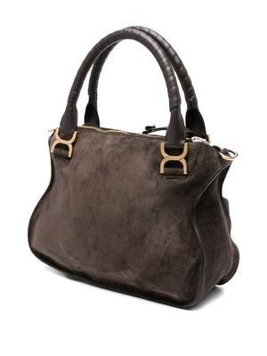 Stylish shot of the Marcie Double Carry Bag in Kohl Brown featuring saddle stitching and iconic gold-tone buckles.