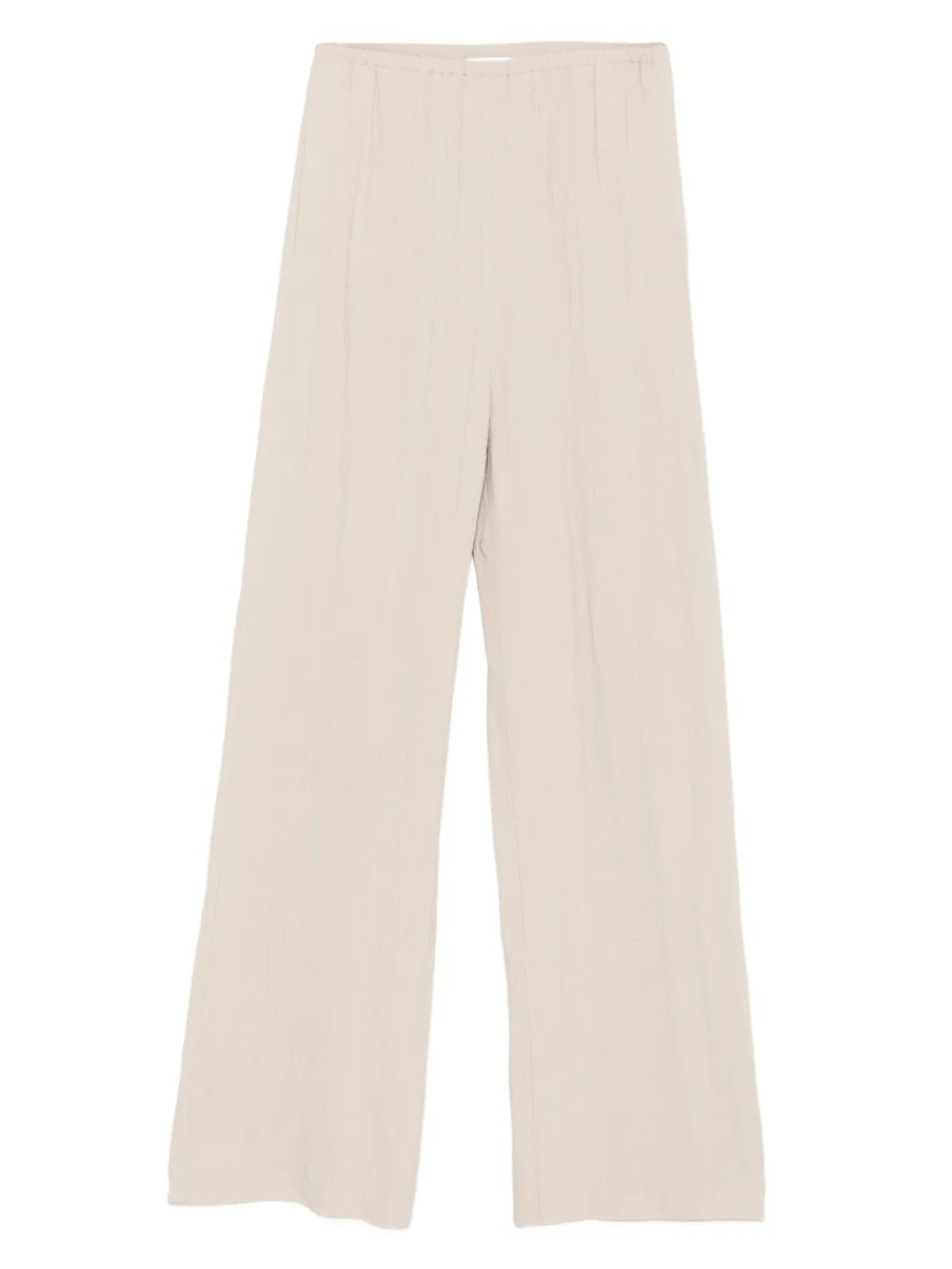 Arvenn Pants in Sand by Nanushka showcasing relaxed tailoring and an elastic waist for comfort.