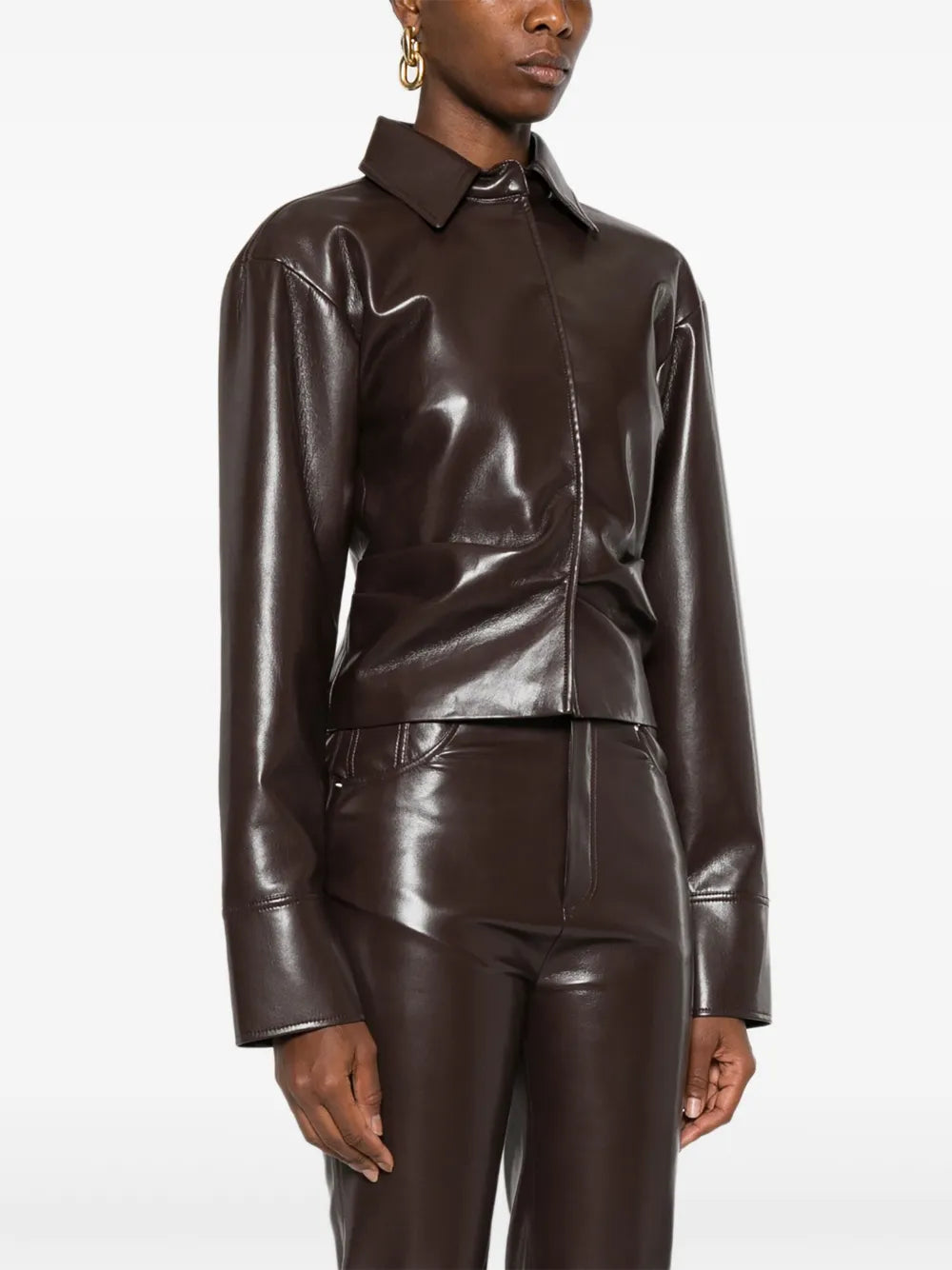 The Hildie Shirt in Coffee Ground displayed on a model, illustrating the flattering hem and rich color.