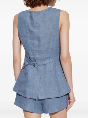 Side angle of Thea Vest in Steel Blue to capture the elegant silhouette and craftsmanship.