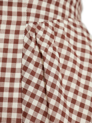 Elegant look of the Callie Dress in Petite Mocha Gingham with adjustable tie feature on the back.