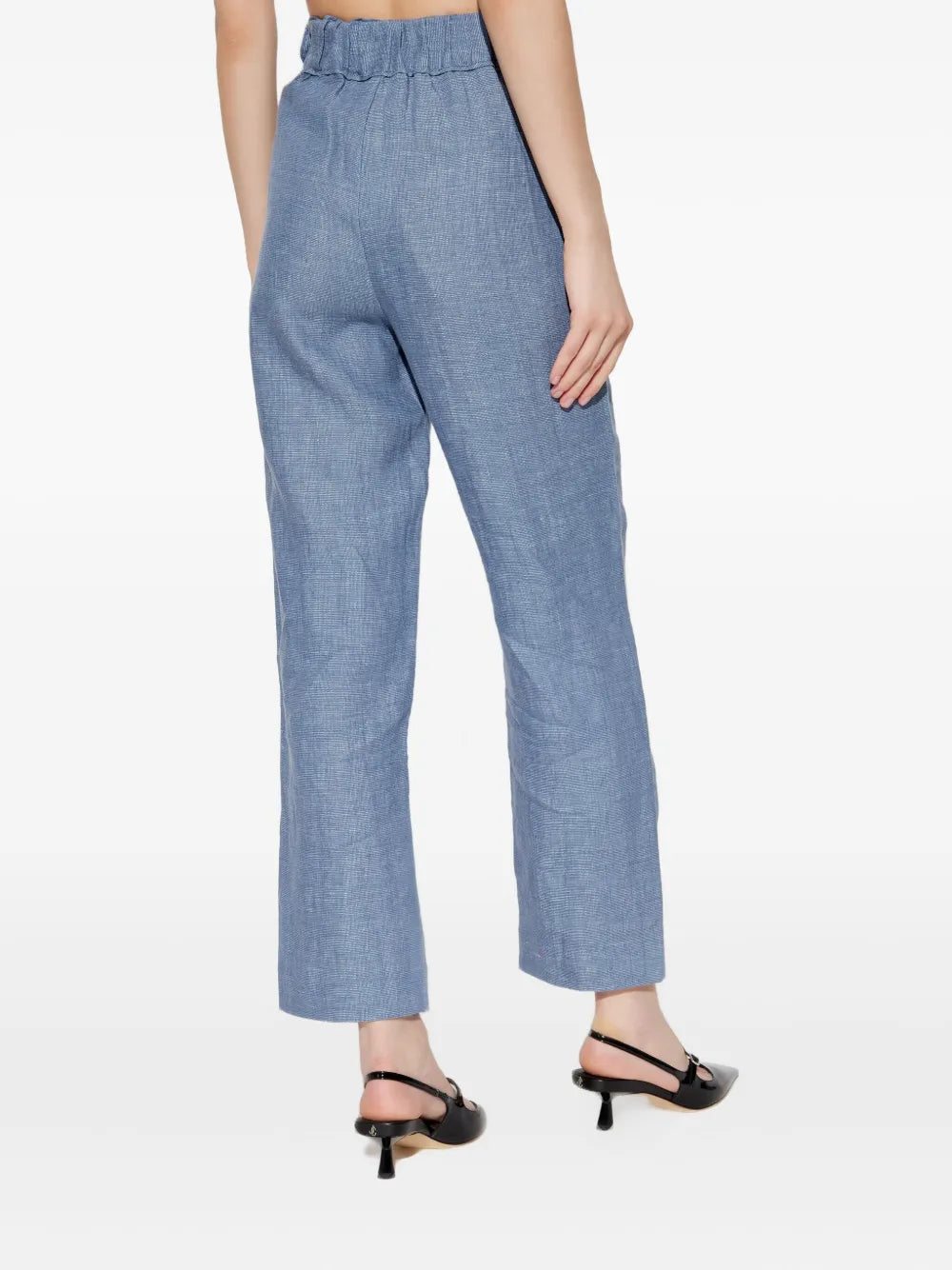 Back view of Thea Trousers in Steel Blue, focusing on the flattering high-rise waist and tailored fit.