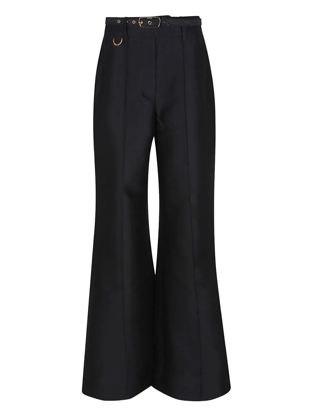 Model walking in the Hypnotic Flare Pant in Black, capturing the flowy movement and elegance of the garment.