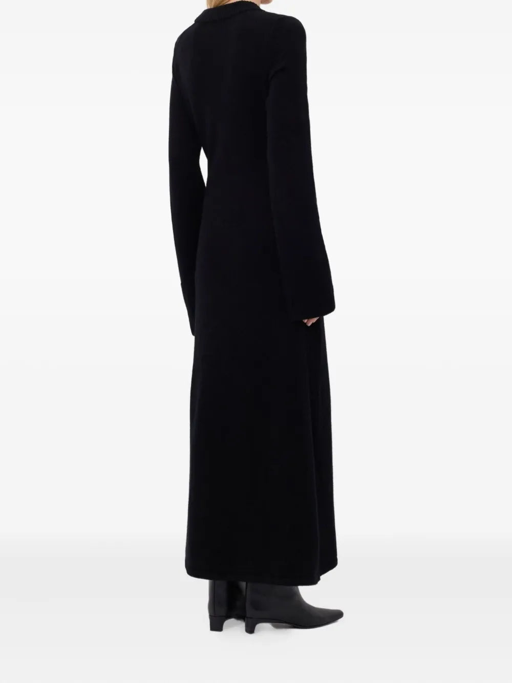 Detail of the Ari Dress in Black, highlighting its feminine allure and elegant design.
