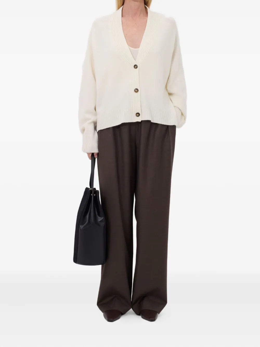 Close-up of the Kaia LDS V Neck Cardigan in Ivory, highlighting the rib details along the neckline and cuffs.