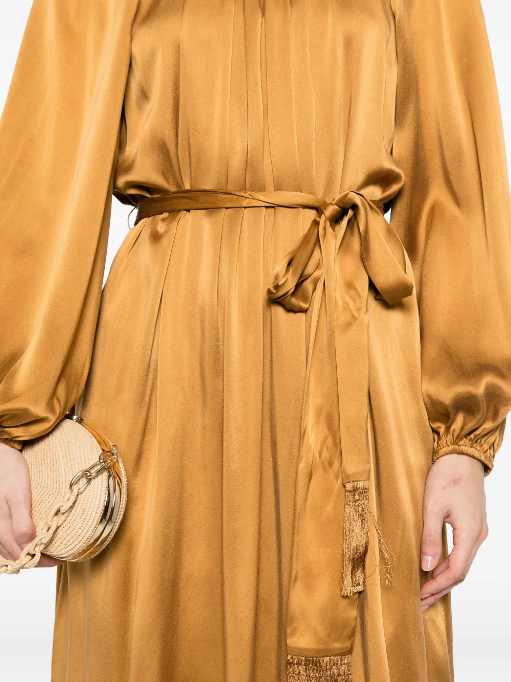 Full view of the Hypnotic Twist Sheath Dress in Toffee on display, emphasizing its chic midi length and sophisticated design.