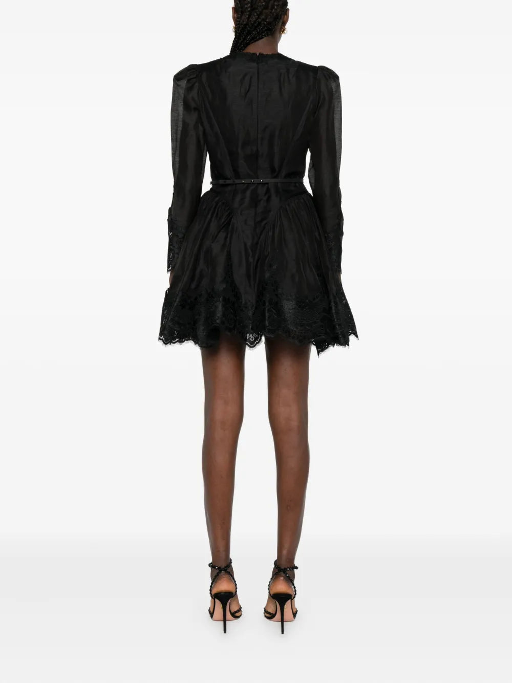Back view of Hypnotic Lace Trim Mini Dress in Black, emphasizing the design and elegant silhouette.
