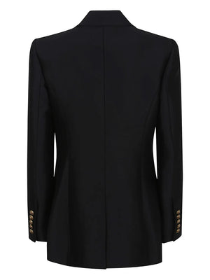 Runway shot of the Hypnotic Tailored Jacket in Black, capturing its striking appearance and elegance as seen in Zimmermann's latest collection.