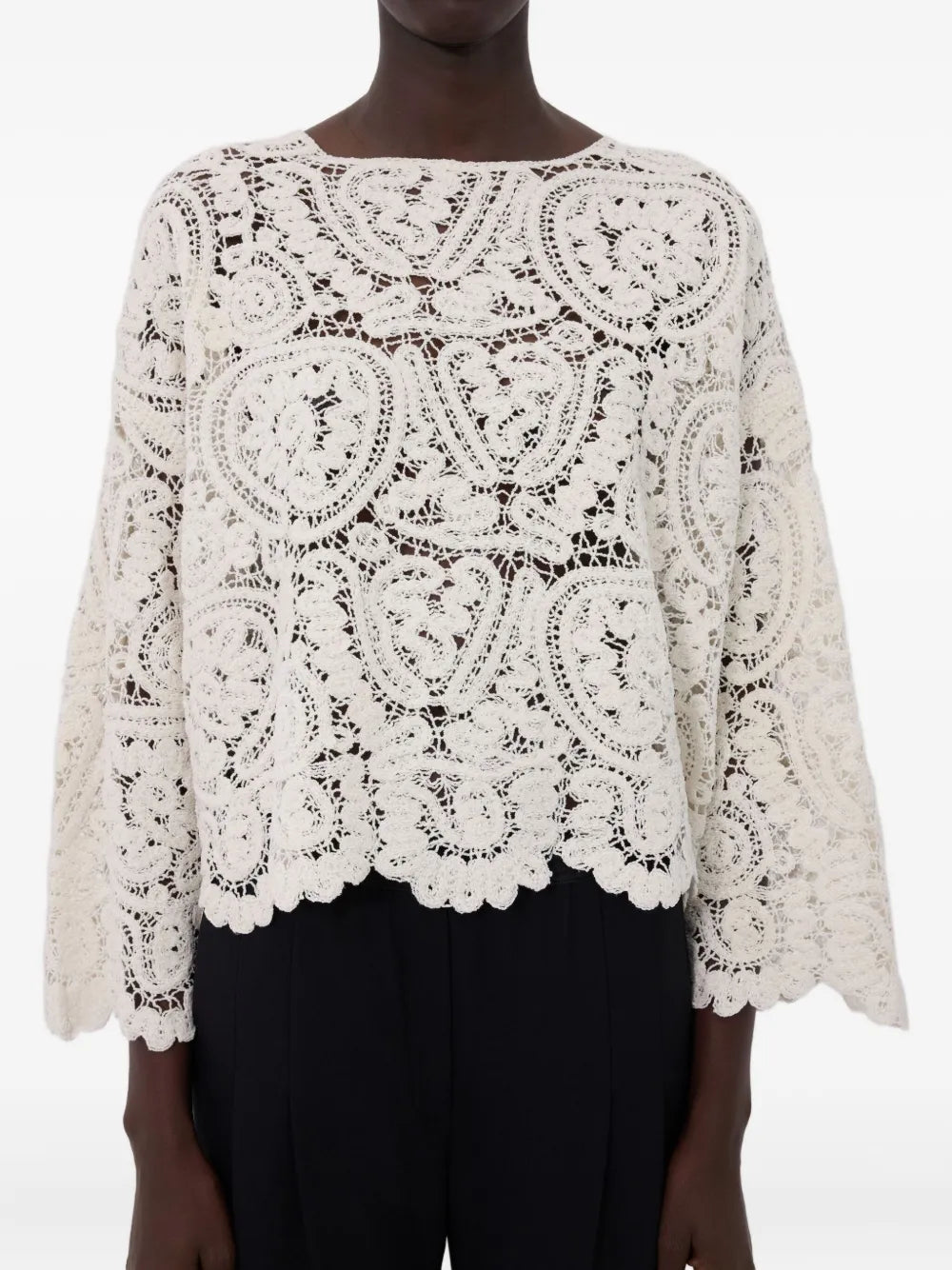 Fashionable display of the Arold Sweater in Ivory, a standout piece for stylish outfits.