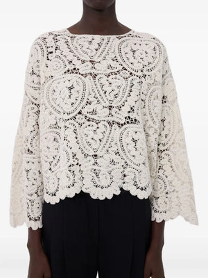 Fashionable display of the Arold Sweater in Ivory, a standout piece for stylish outfits.