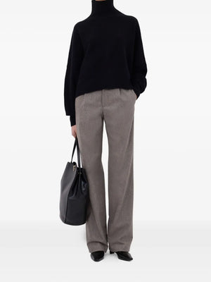 Close-up view of the Luke Stand Collar Sweater in Black detailing the cozy wool and cashmere blend fabric.