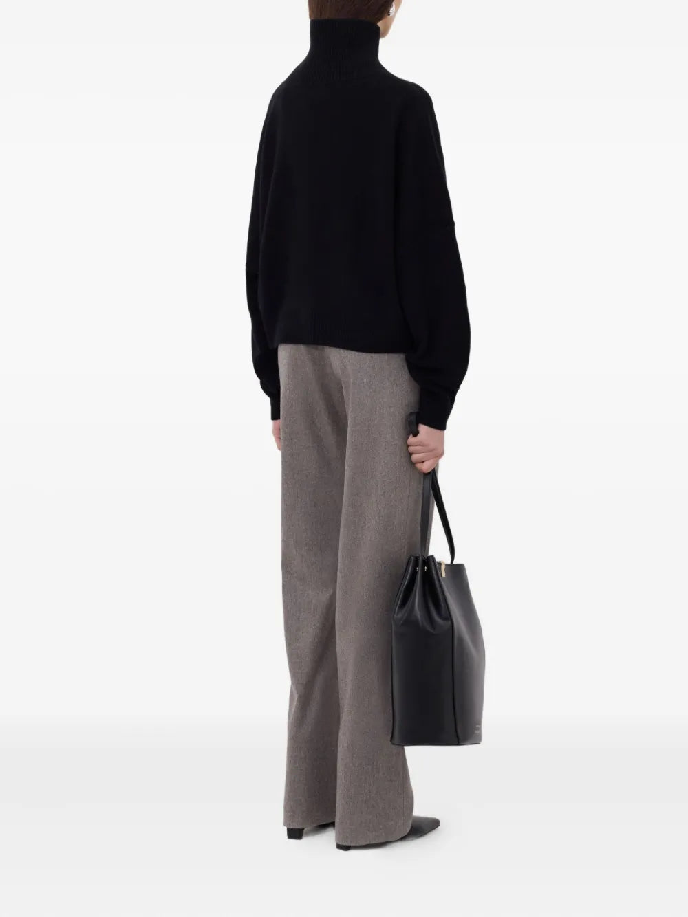 Stylish display of the Luke Stand Collar Sweater in Black, emphasizing its straight fit and drop shoulder design.