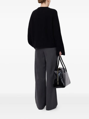 Back view of Axel Ribbed Cashmere Sweater in Black, showcasing the ample fit and drop shoulders.