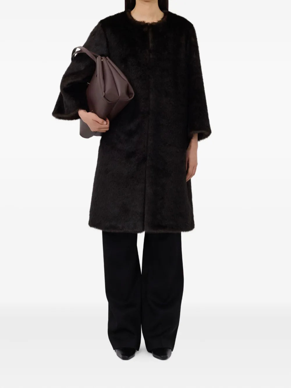 Close-up of the Moore Faux Fur Coat in Grizzly, highlighting the luxurious faux fur detail and chic 3/4 sleeves