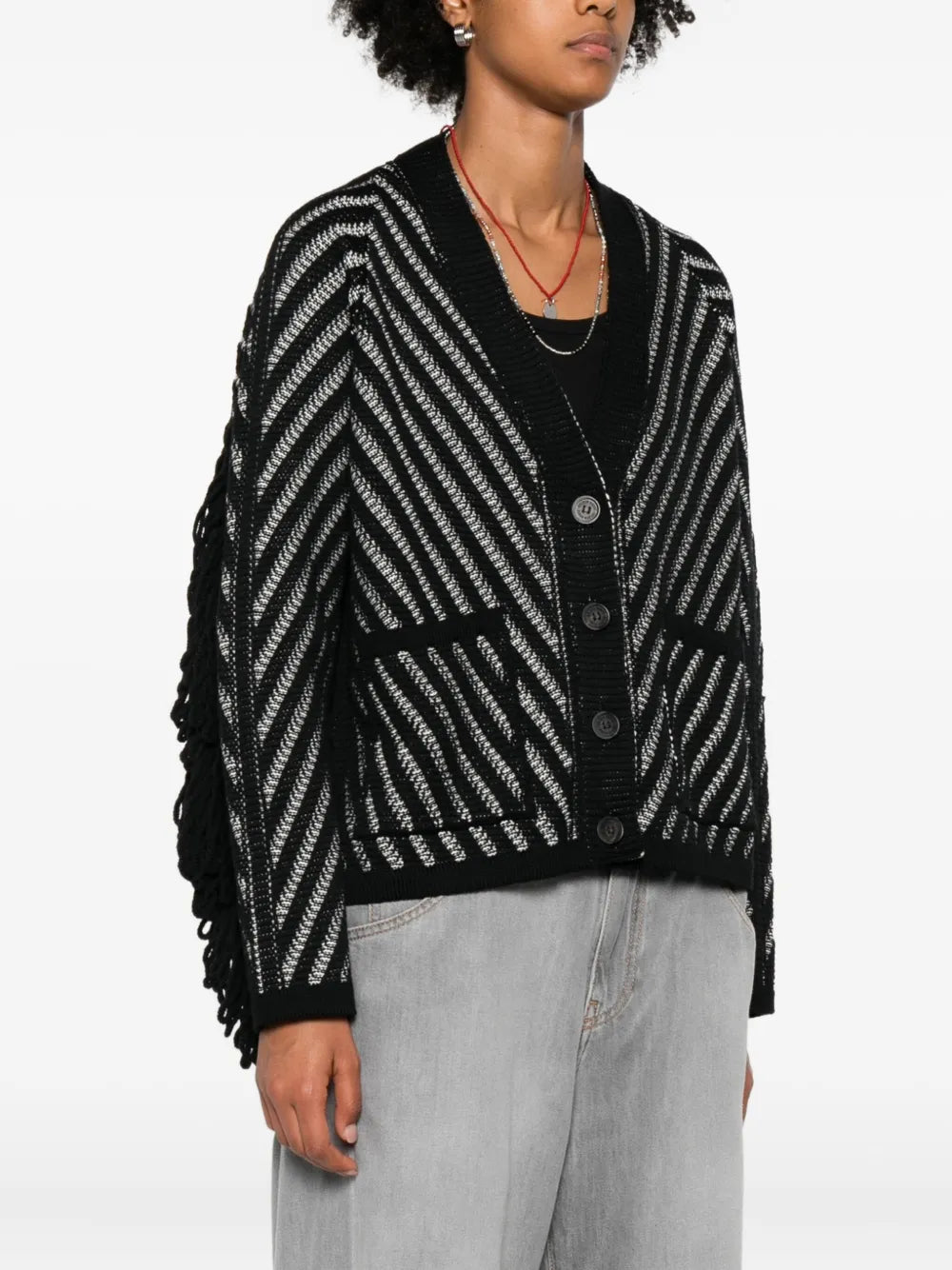 Back view of the Journey Olidia Cardigan in Black/White showcasing fringe embellishments.