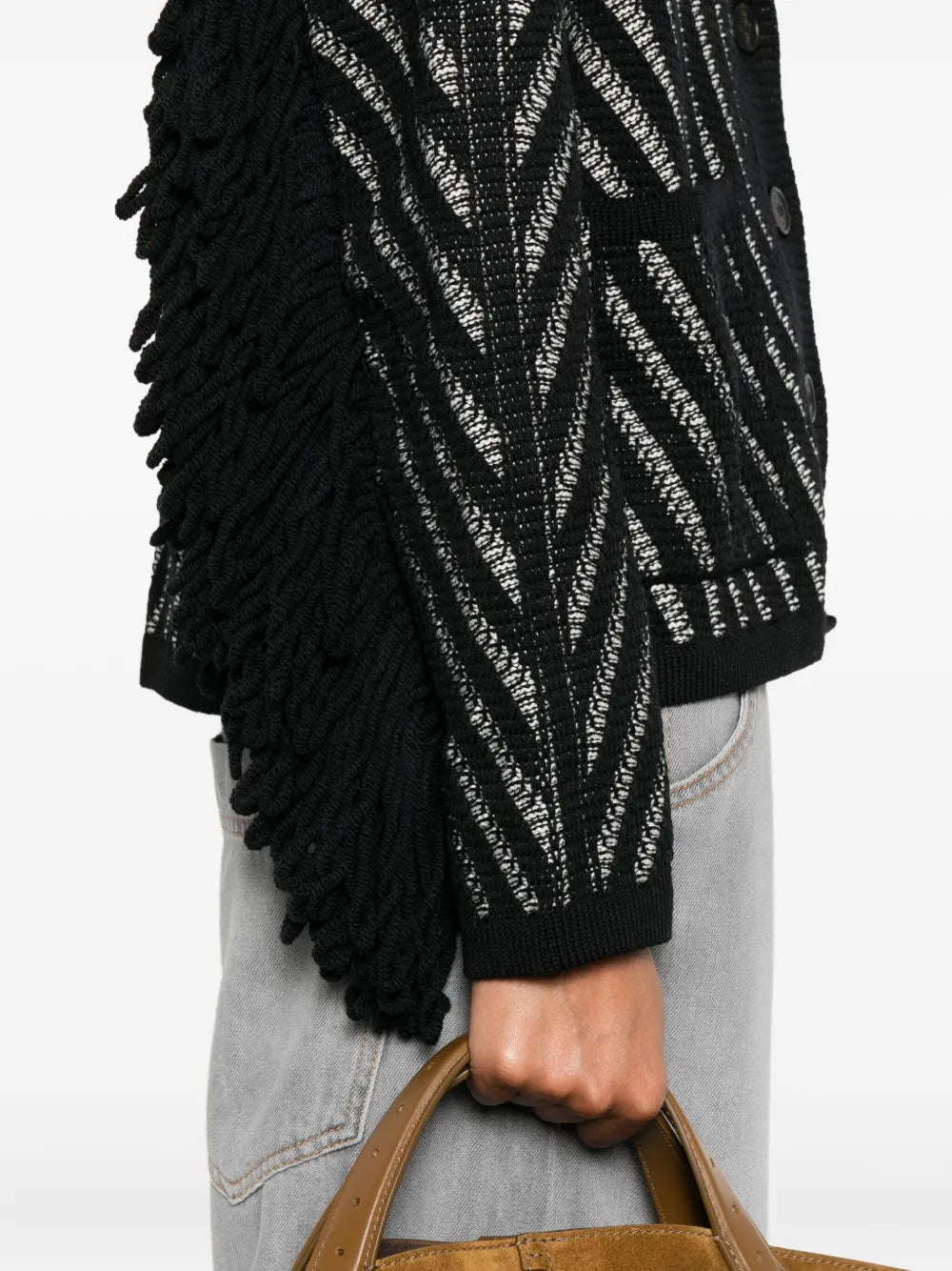 The Journey Olidia Cardigan in Black/White draped elegantly on a model, illustrating its chic appeal.