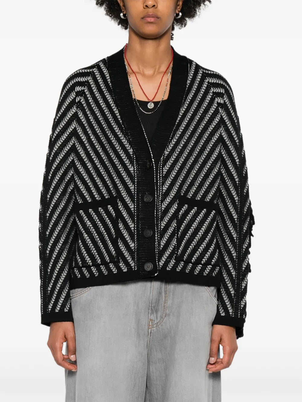 Close-up view of the Journey Olidia Cardigan in Black/White highlighting the intricate knit texture and unique design.