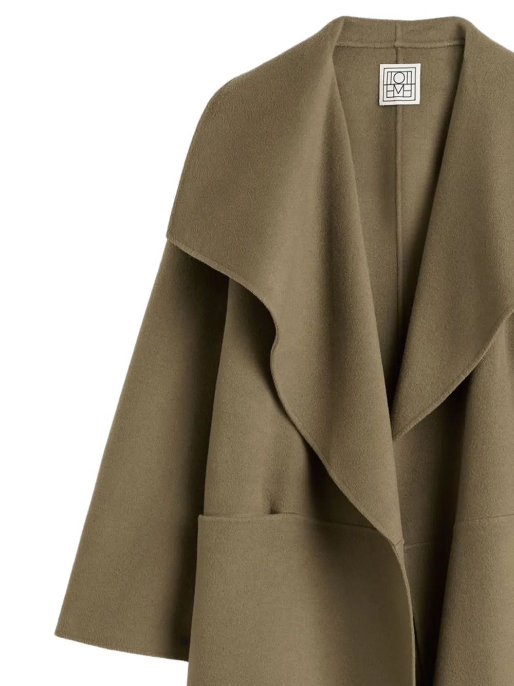 Detail view of the TOTEME Signature Doublé Coat in Hazel, highlighting the clean seams and elegant open front design.