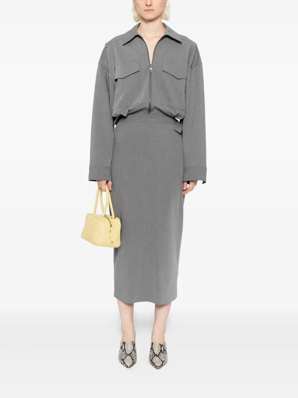 Detail view of the Scout Dress in Static Grey highlighting its sleek column skirt by Staud.