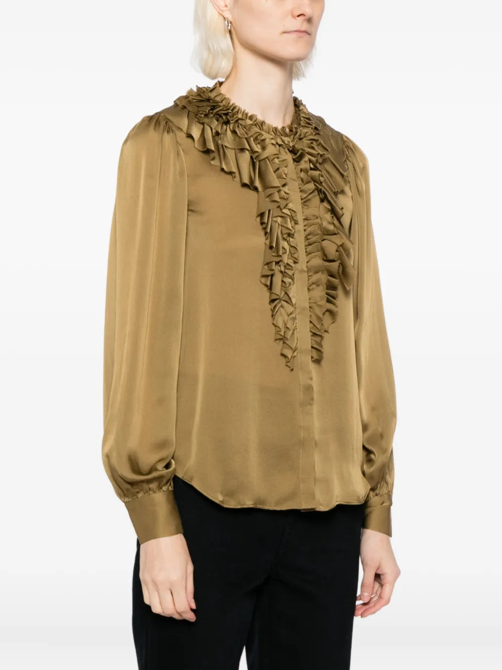 Model wearing the Rouen Blouse in Willow, highlighting its distinctive ruffled details and stylish silhouette.