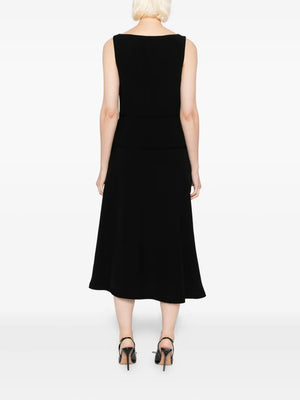 Detailed view of Ulla Johnson Vivi Midi Dress in Noir, emphasizing the luxurious fabric and timeless design.