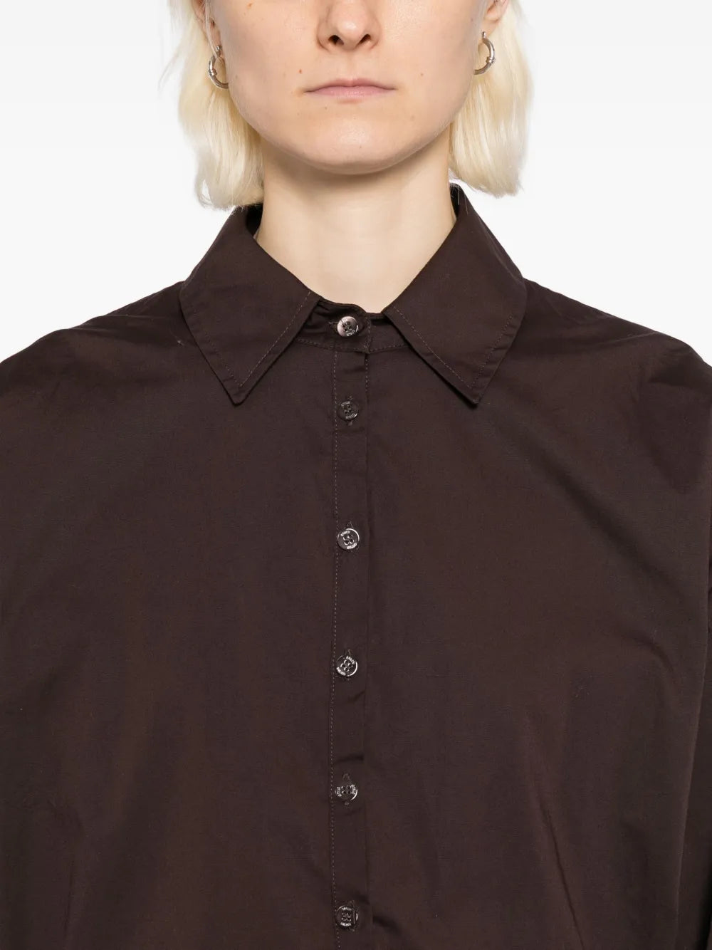 Back view of the Cynthia Dress in Earth by Staud, showing the dress's mini skirt and sleek fit.
